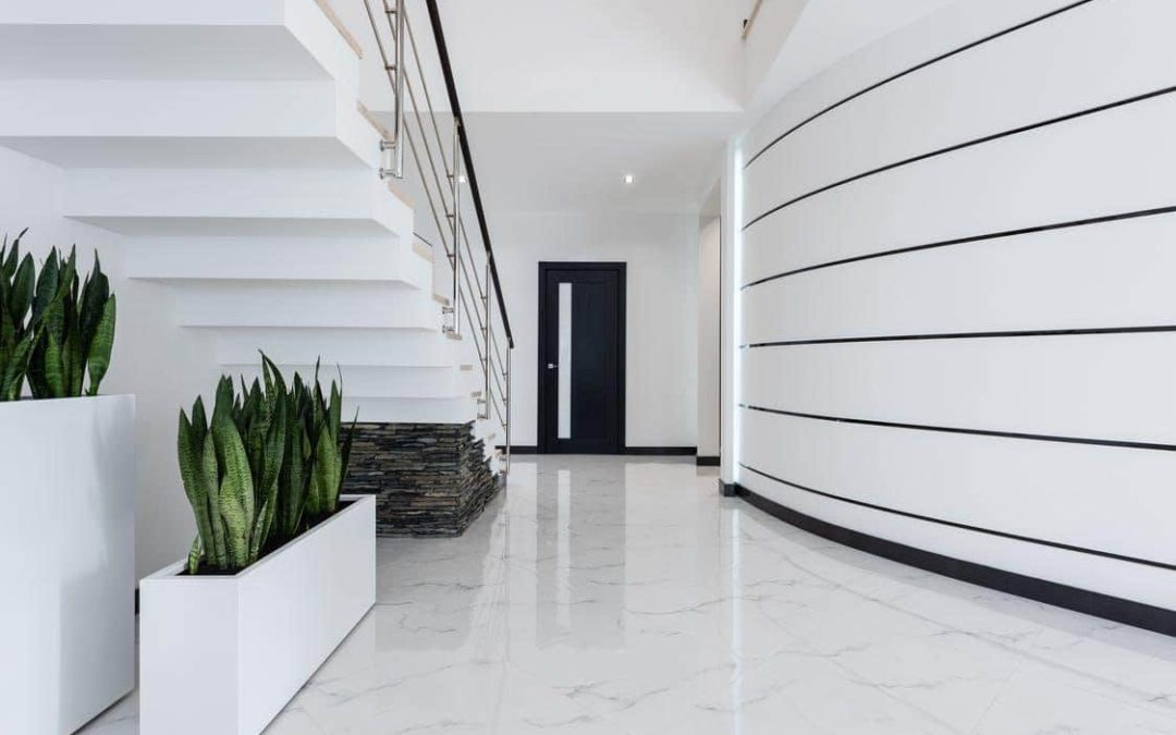 A decorated hallway of a villa with marble flooring | Avoid these marble cleaning mistakes